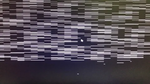 A close-up of a malfunctioning black screen displaying numerous thin, horizontal white lines, which illustrates the common screen defect caused by LED panel failure due to overheating in high-temperature environments like Dubai.